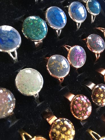 Multicoloured resin rings of various styles