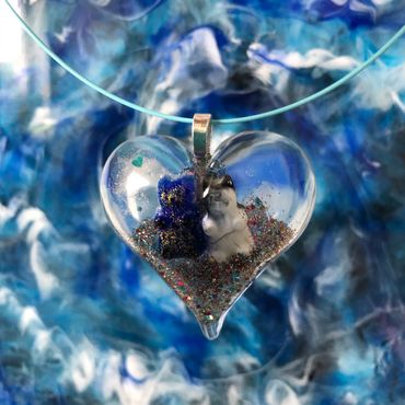 Large resin heart pendant necklace with resin blue and white gummy bears embedded