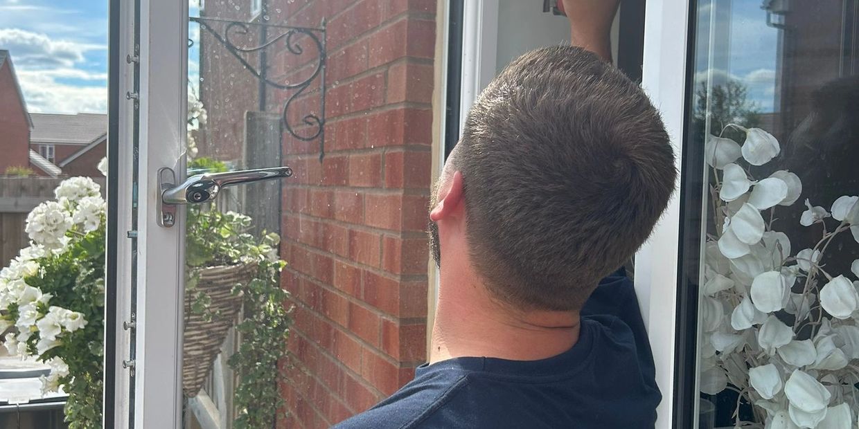 Kalun repairing a uPVC window for Window Doctor Worcester.