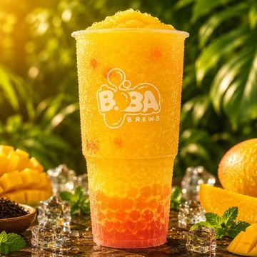 A refreshing mango boba drink with ice and tapioca pearls in a clear cup.