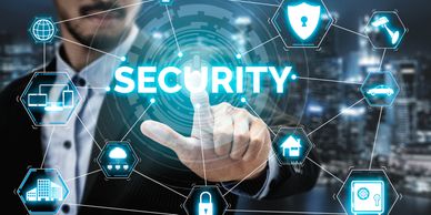 A person touching a screen for Security Information and Event Management.