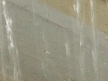 Before: Original gutter system leaking and causing water damage