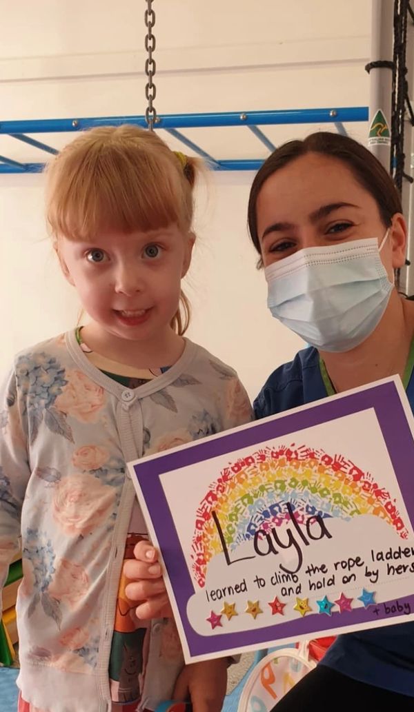 Layla learned to climb the rope ladder and hold on by herself!