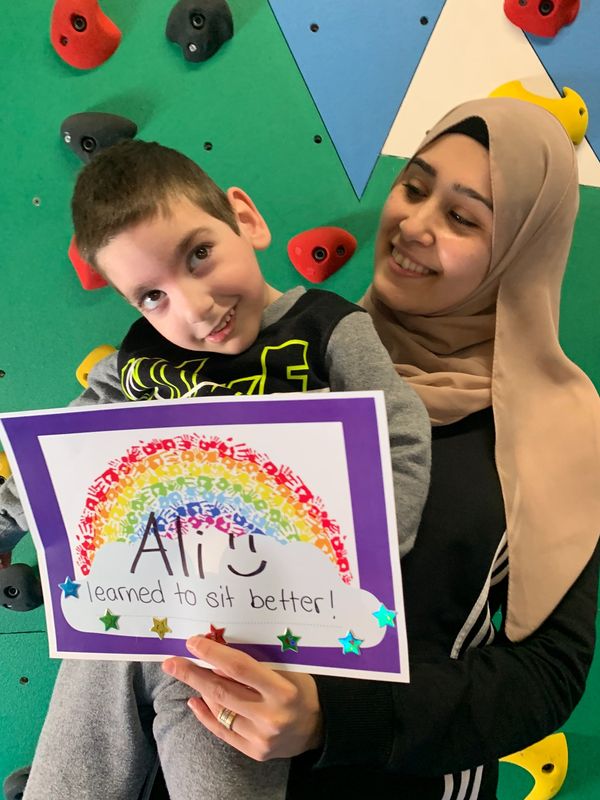 Kid learned to sit better in intensive physiotherapy