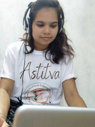 A girl using Laptop donated by Foundation