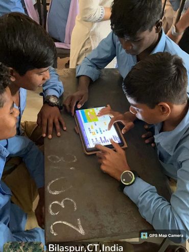 Scratch coding session in a village