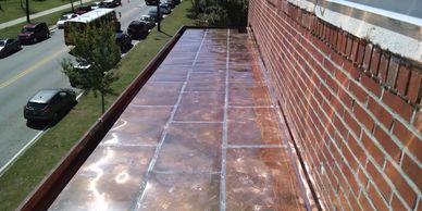 Flat seam copper roof with built in gutter. All soldered.