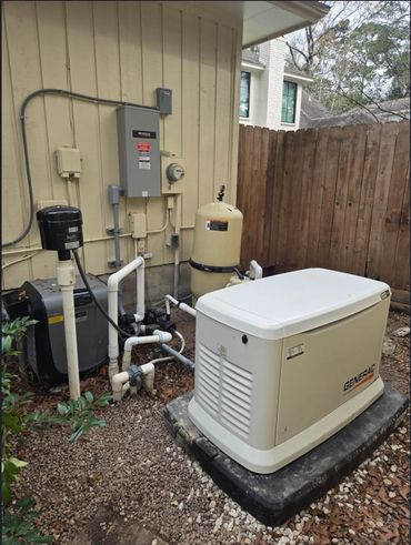 Generac standby generator installed outside a house near a pool pump system.