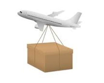 An airplane carrying a large cardboard box.