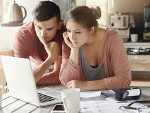 A couple starting their home buying journey on-line