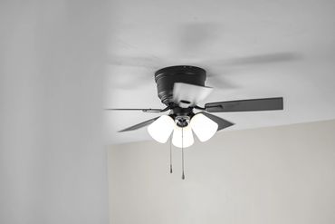 Modern final touches and ceiling fan light fixtures installed by Rasnic one Pros.