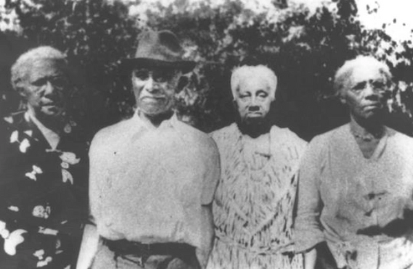 Three women and one man from the Quander family during a family reunion