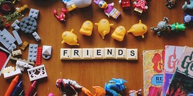 Scrabble letters making the word "Friends"