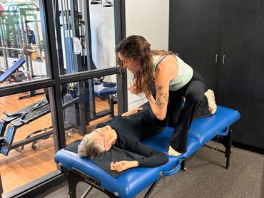 Assisted stretching for senior clients improves flexibility and mobility at Top Shape.