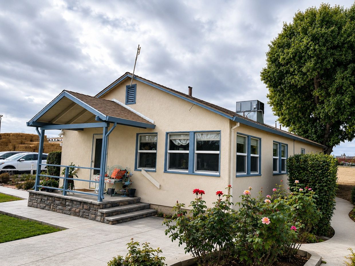 Newman CA home addition by Cordeiro Custom Remodeling — covered porch, stacked stone entry steps, an