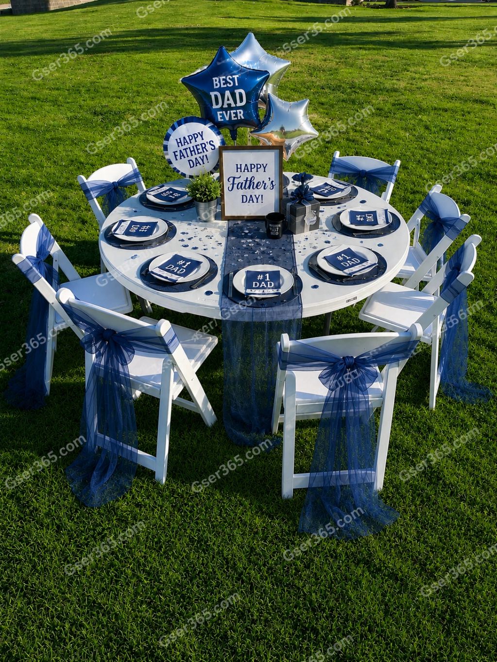 Outdoor Father's Day table setup with blue decorations and balloons.