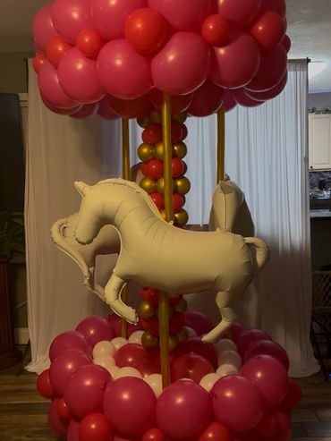 Moving carousel made of balloons