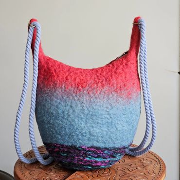 Blue Red with Galaxy Bottom and Cotton Strap. Zipper Closure $150