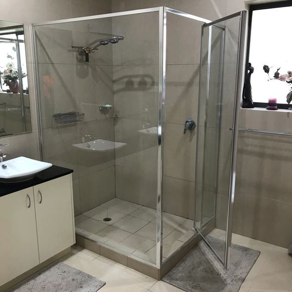 Large custom made fully framed shower with pivot door