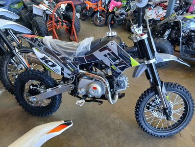 Brand new dirt bike with off-road tires.