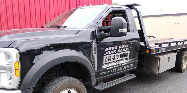 The Tow Truck for Doug Buys Junk Cars.