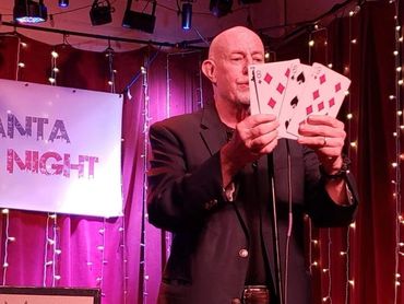 Jim performing at Atlanta Magic Night