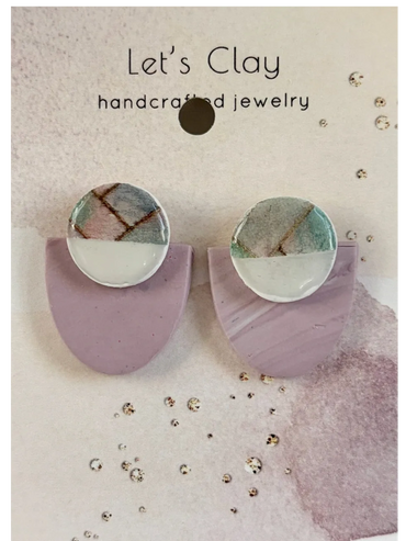 Handcrafted clay earrings with geometric design in pastel colors.