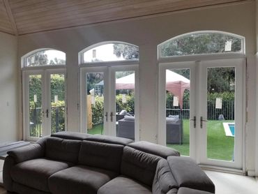 ECO French Doors White 7/16 w/ Designer Eyebrow above w/ Clear Glass
Impact Windows and Doors