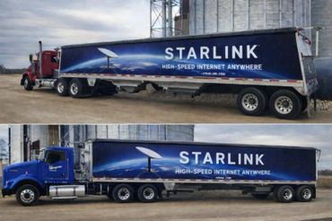 Two trucks with Starlink ads promoting high-speed internet anywhere.