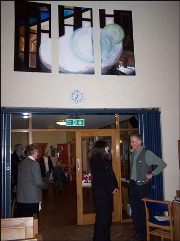 Claire and her father at the presentation of the art to the church