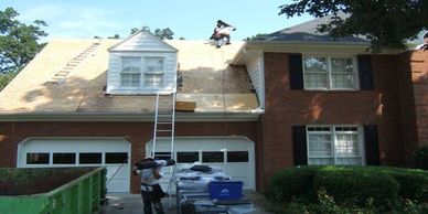 Tear off the roofing down to the sheathing.