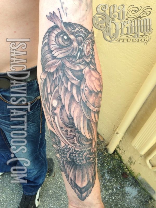 Mechanical owl tattoo 