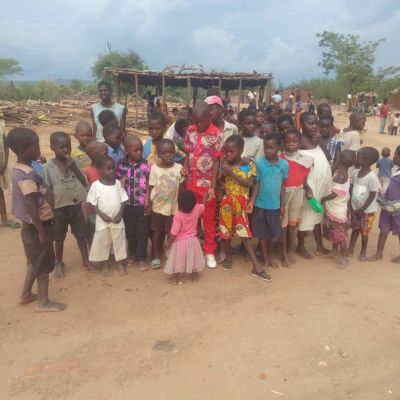 Orphaned and vulnerable children gathered in a rural village in Malawi, highlighting the importance of compassion, community support, and a brighter future for every child.