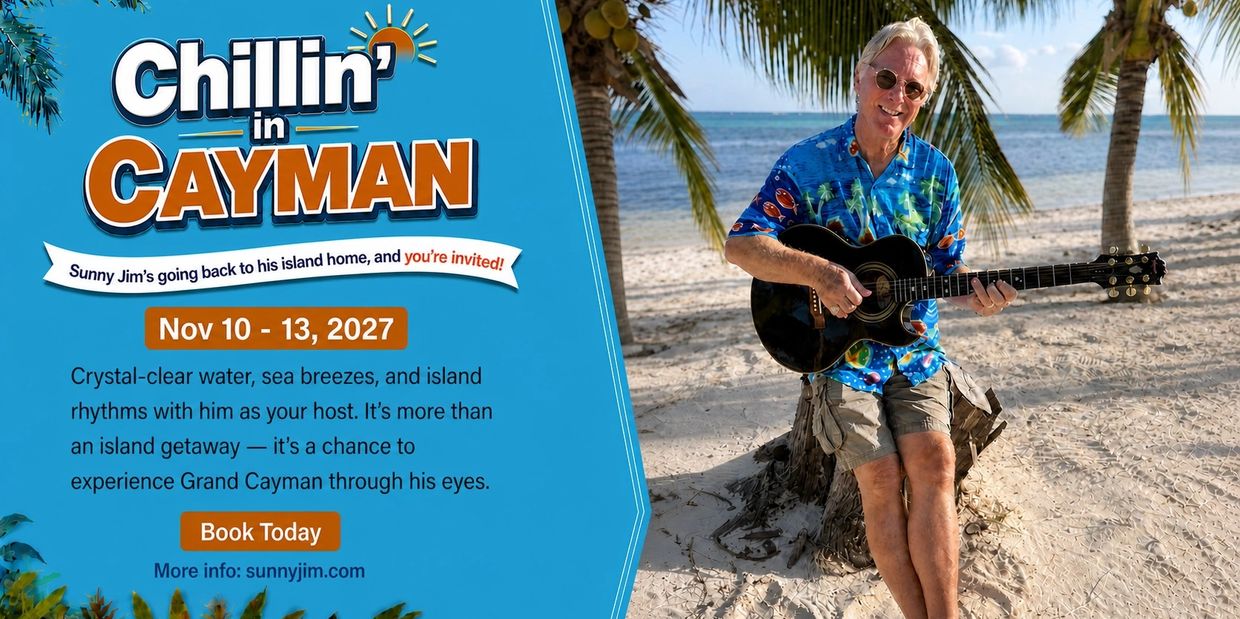 Man playing guitar on Cayman beach under palm trees.