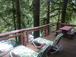 view from Harmony Lodge deck of cascading Index Creek
