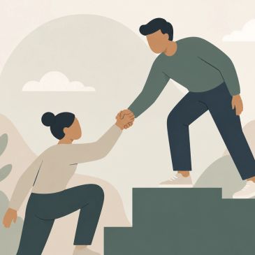 Person helping another climb stairs.