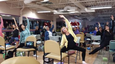 Warrior pose in the chair.