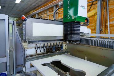 Machinery use to cut our one-of-a-kind Granite or Quartz dog bowl stands.