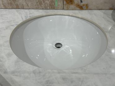 White oval sink for vanity tops.