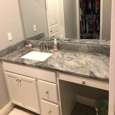 Granite vanity in a small bathroom