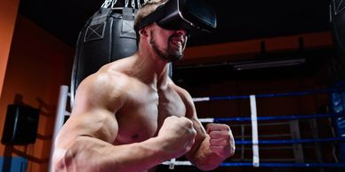 A muscular man wearing a virtual reality headset