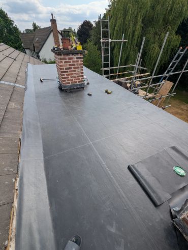 EPDM flat roof installation with brick chimney upstand, Lodge Farm Close, Bramhall