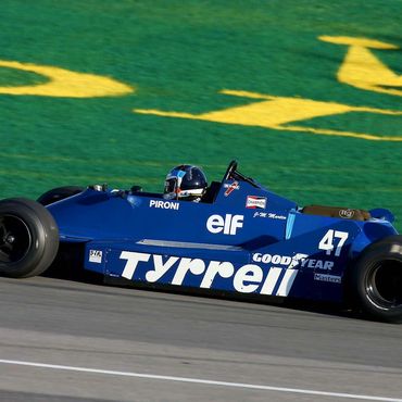 A blue racing car on a track