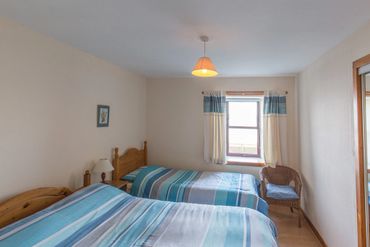 Bedroom 2 at Traigh Bea ch Cottage on Islay