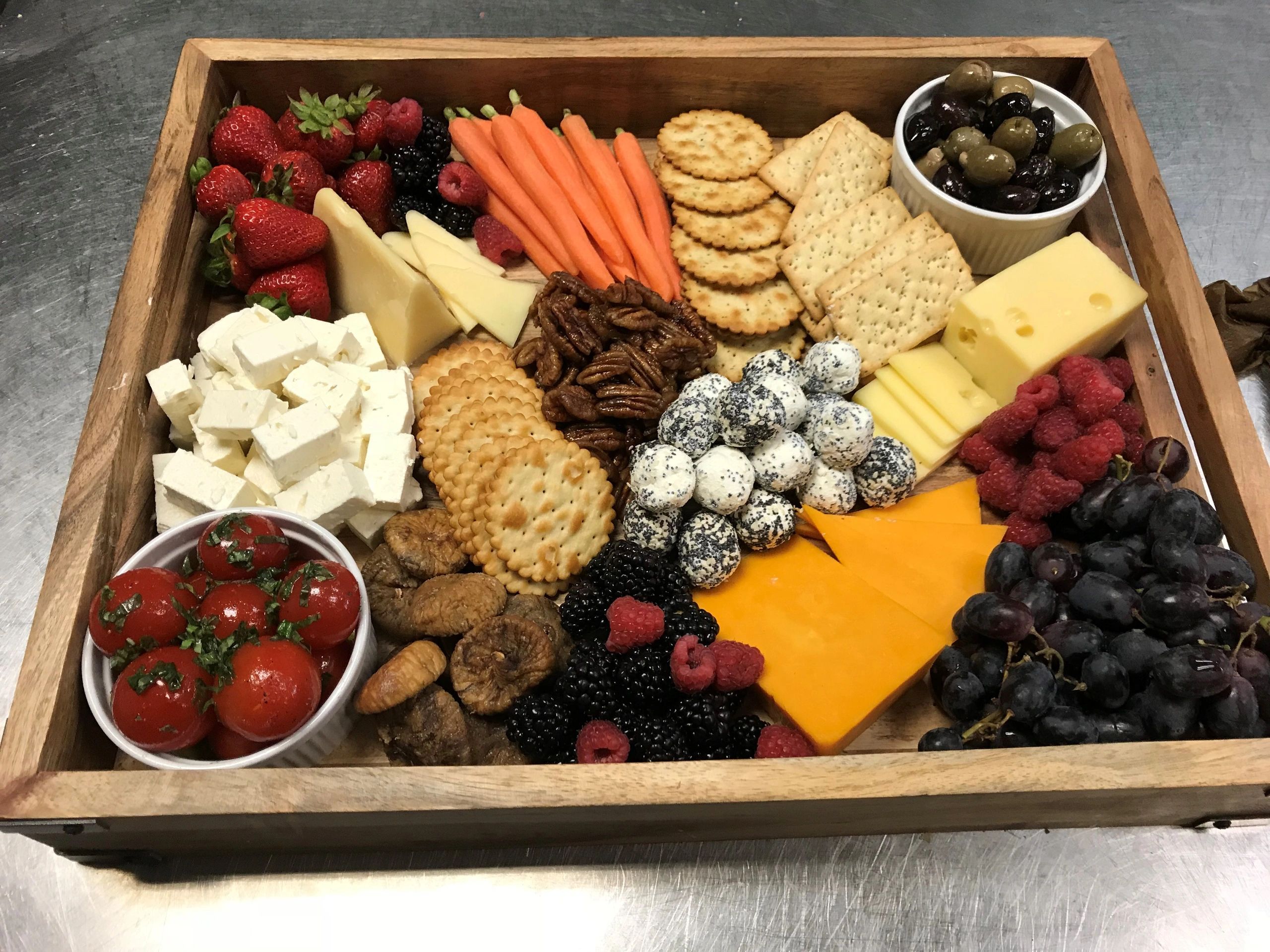 Cold vegetable, cheese and fruit appetizer tray