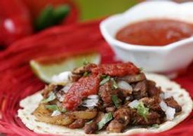 An image of a tasty taco on a plate.