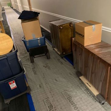 A picture of the furniture packed and moving