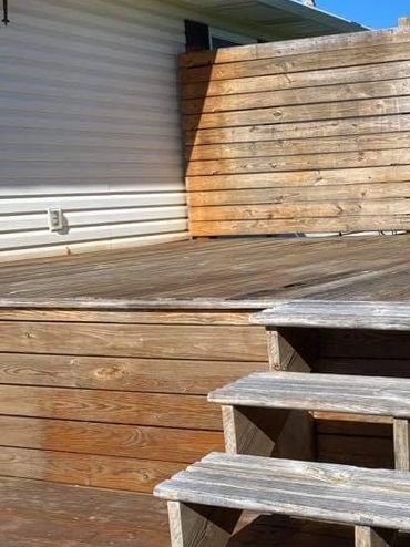 Photo of wooden deck before washing