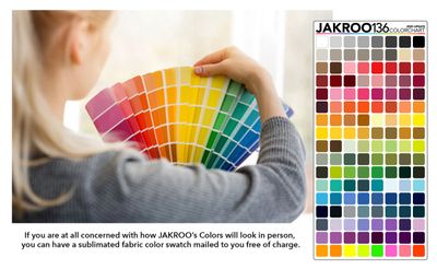 Person holds a vibrant color swatch chart with a fabric color sample offer.