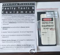 Laminated sign of a reporting procedure for faulty tools & equipment & a bag of tags and cable ties.